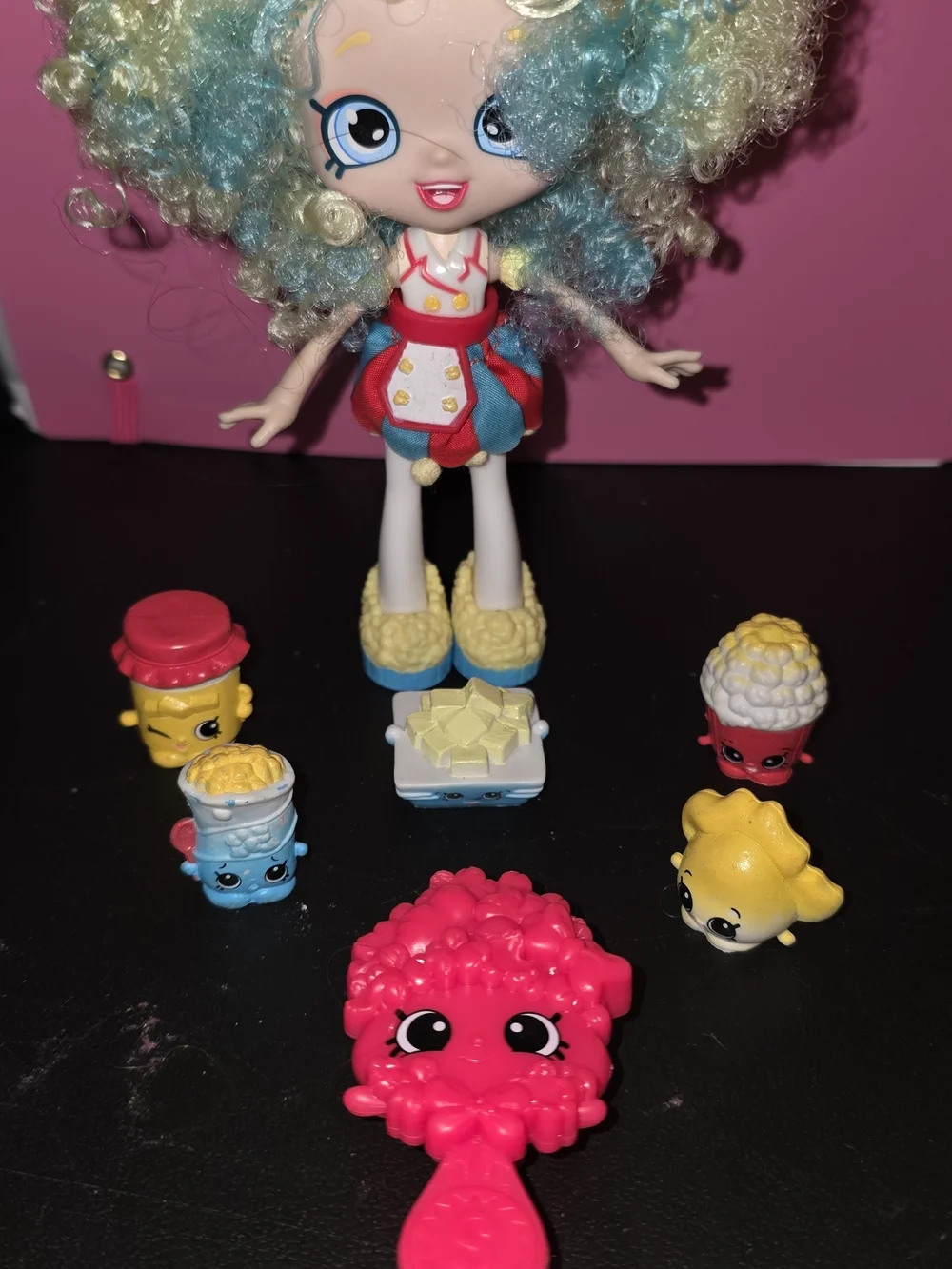 Shopkins Curly-Haired Doll with Blue, Yellow & Pink Accessories